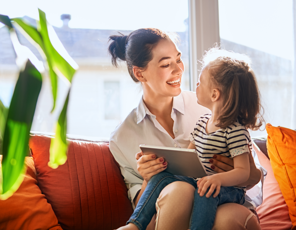 Mom and child enjoying the app together
